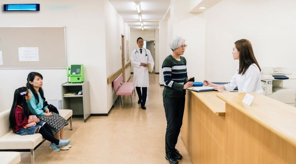 GLOreceptionist-in-hospital-waiting-area