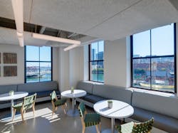 Employees working in the Boston office can get up from their booked desks and have meetings in different spaces. Some of the meeting spaces look out over Boston Harbor, delivering a beautiful water view and supporting employee wellbeing. Employees working in the Boston office can get up from their booked desks and have meetings in different spaces. Some of the meeting spaces look out over Boston Harbor, delivering a beautiful water view and supporting employee wellbeing.