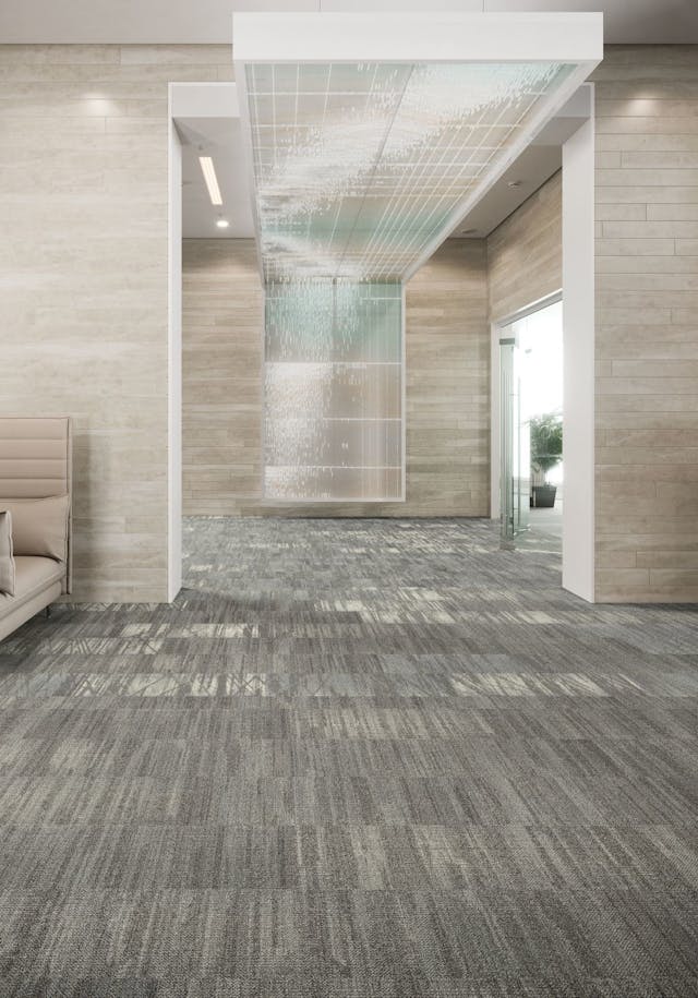 Data Tide is a collection of modular carpet planks that explores the symbiotic relationship between nature and data through the visualization of water.