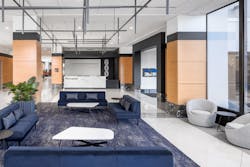 The lobby of 600 Metropoint features a strategic deployment of black and white highlights that modernizes the existing wood paneling. Comfortable seating gives guests and tenants’ employees a place to land. The lobby of 600 Metropoint features a strategic deployment of black and white highlights that modernizes the existing wood paneling. Comfortable seating gives guests and tenants’ employees a place to land.