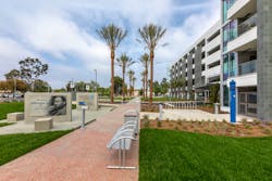 A pedestrian pathway features various sculptures and monuments that chronicle the MLK Jr. Community Hospital's storied past. A pedestrian pathway features various sculptures and monuments that chronicle the MLK Jr. Community Hospital's storied past.