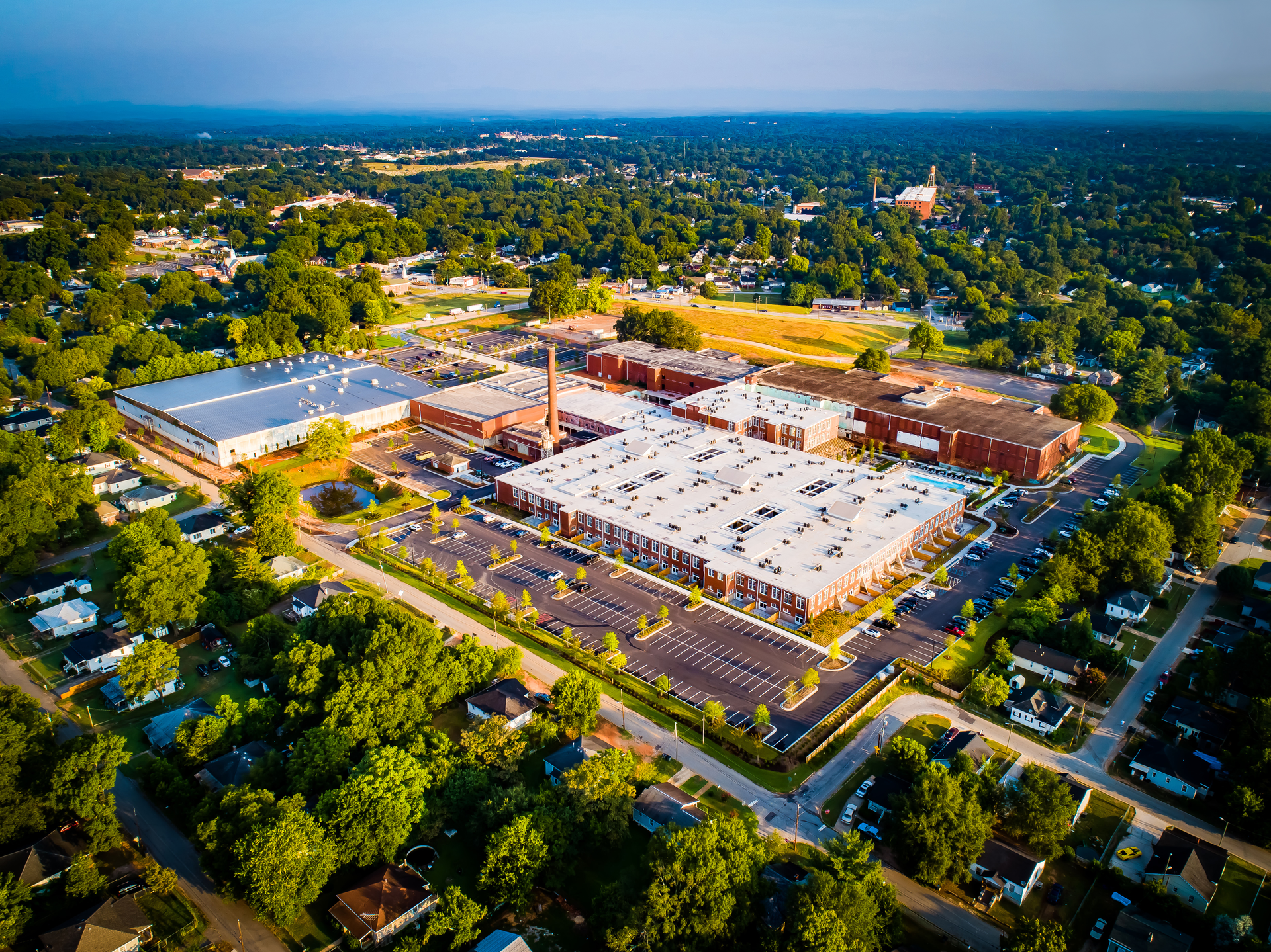 The 36-acre Judson Mill campus is now an innovative social hub with apartments, office space and entertainment, including a large-capacity concert venue.