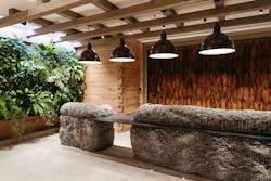 The front desk is constructed from Tennessee granite and is backdropped by an install of tobacco leaves. Details from the team's visit to Nashville's Fort Nashborough can be found throughout the lobby. The front desk is constructed from Tennessee granite and is backdropped by an install of tobacco leaves. Details from the team's visit to Nashville's Fort Nashborough can be found throughout the lobby.