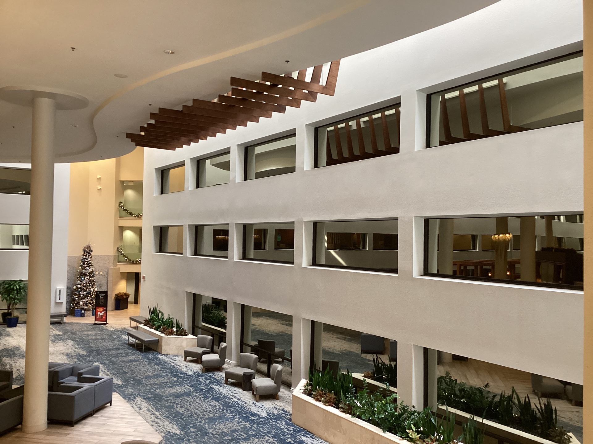 The San Antonio Marriott Northwest has a welcoming four-story inner atrium to greet visitors. The guest rooms facing the atrium now feature window film that keeps people in the atrium from seeing into guest rooms.