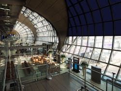 This rendering demonstrates the effect that smart glass has for large-scale facades and atriums, including reducing glare for passengers waiting in line while still providing unobstructed exterior views. This rendering demonstrates the effect that smart glass has for large-scale facades and atriums, including reducing glare for passengers waiting in line while still providing unobstructed exterior views.