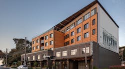 Aegis Living is a 73,000-square-foot assisted living community in Seattle, Washington. The electrified building features the rowing history of the area through imagery and integrated designs.