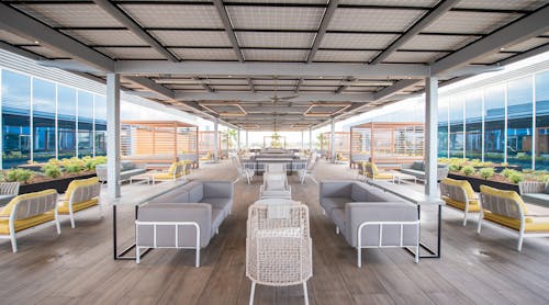 Edwards LifeSciences invested in its outdoor spaces to create a residential feel for employees to enjoy the Southern California weather. Outdoor and rooftop areas like this one are a popular amenity.