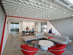 The entry is comprised of a lounge and coffee bar, accentuated by MKG's signature pops of red. The entry is comprised of a lounge and coffee bar, accentuated by MKG's signature pops of red.