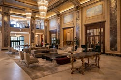 The Belden-Stratford’s ornate double-height lobby features restored original elements such as gilded plaster molding and gold-leaf detailing. The Belden-Stratford’s ornate double-height lobby features restored original elements such as gilded plaster molding and gold-leaf detailing.