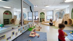 A multi-level fort at the far end of the classroom creates a destination for toddlers to discover as they make their way through the room. A multi-level fort at the far end of the classroom creates a destination for toddlers to discover as they make their way through the room.