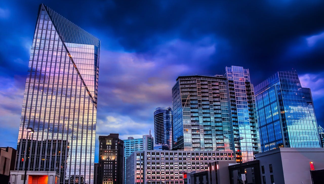 (Photo: Atlanta city skyline) A spin-off company of JE Dunn Construction, Aptitude: Intelligent Integration bills itself as a provider of digital and physical connectivity solutions that use a unique combination of tailor-made design processes and cutting-edge technology to deliver connected built environments for commercial real estate.