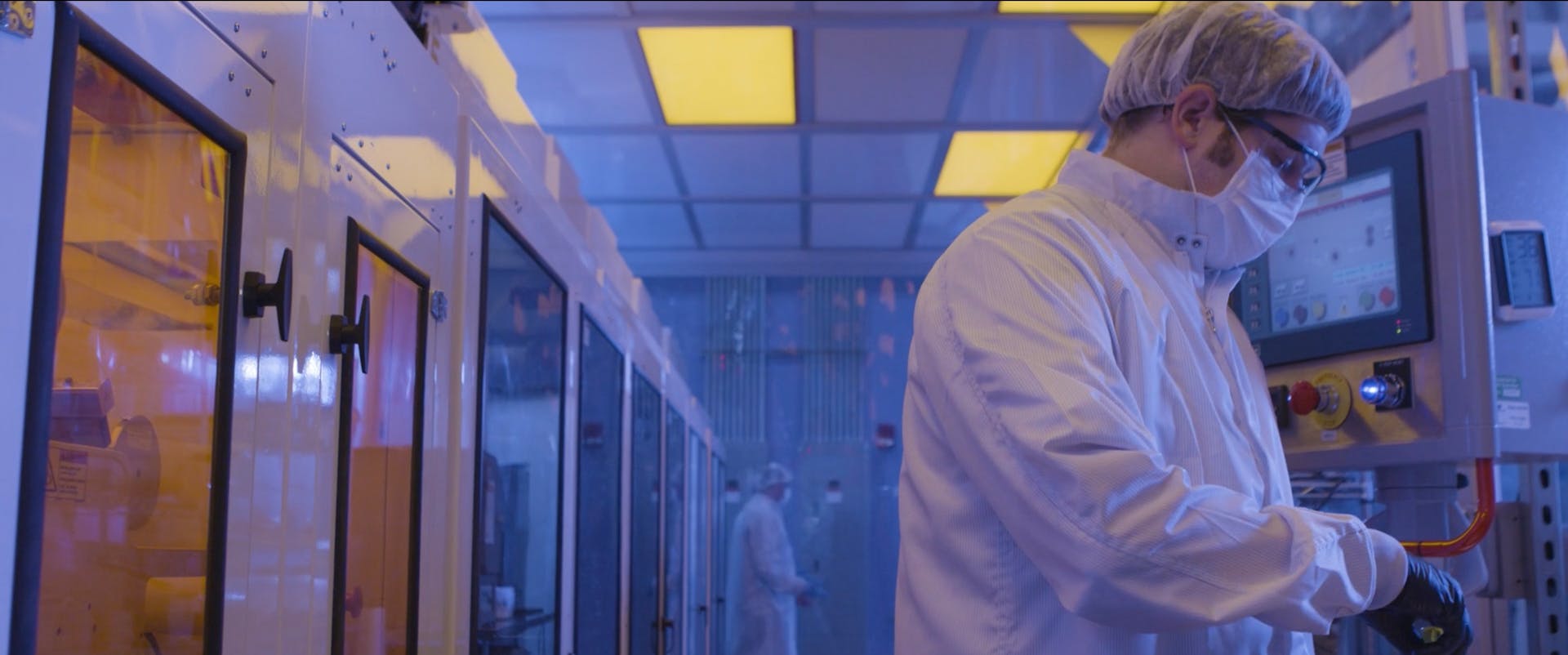 A technician in Crown Electrokinetics' Corvalis, OR engineering lab.