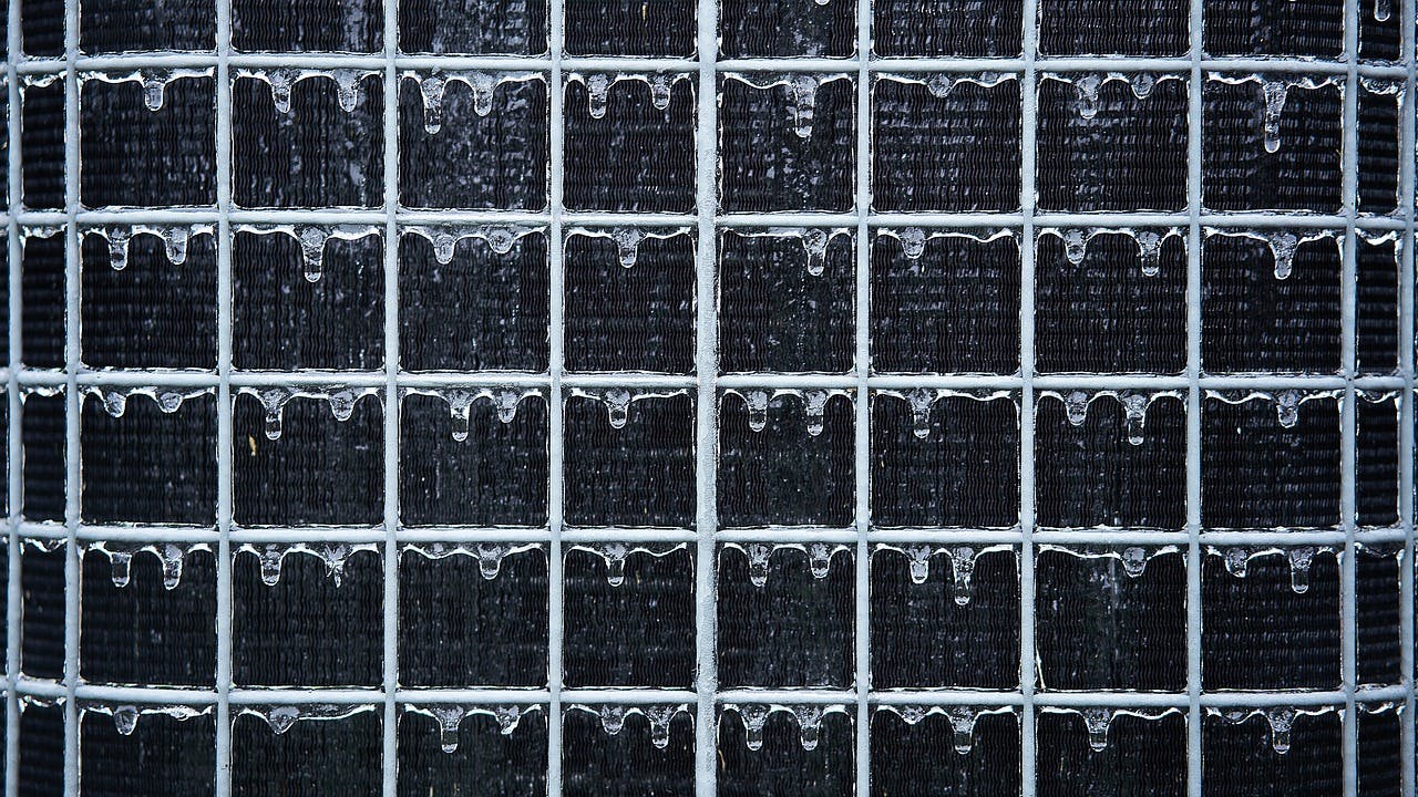 An air conditioner vent on a commercial building.