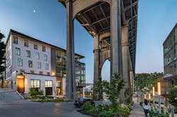 Located in Seattle's Fremont neighborhood, the Watershed building is sited next to the Aurora Bridge. The building was designed by local architecture, landscape architecture, and interior design firm Weber Thompson, which is also now a tenant. Located in Seattle's Fremont neighborhood, the Watershed building is sited next to the Aurora Bridge. The building was designed by local architecture, landscape architecture, and interior design firm Weber Thompson, which is also now a tenant.