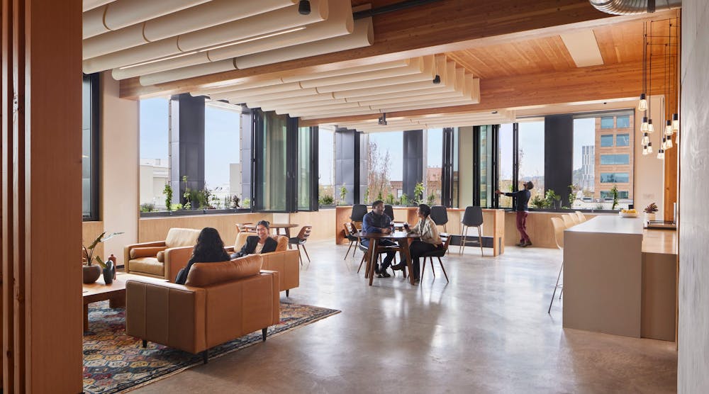 On the PAE Living Building&apos;s fifth floor, occupants enjoy a &apos;deckony&apos; with gathering spaces, fresh air, expansive views out, and elements of biophilic design.