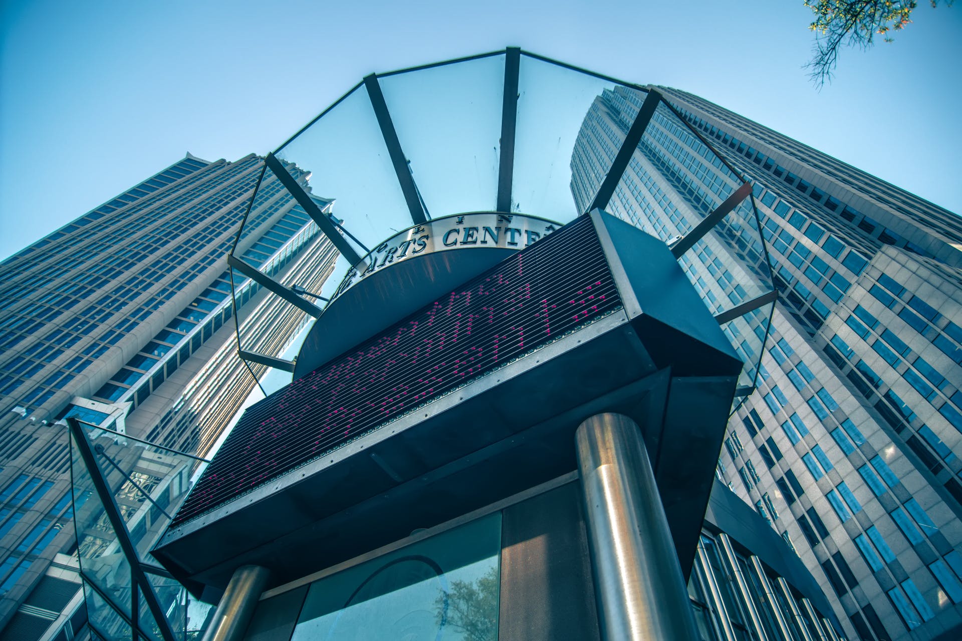 High-rise buildings flank Charlotte's Blumenthal Performing Arts Center.