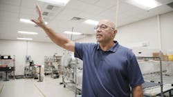 Ken Packwood explains the lighting installation at Novanta. Ken Packwood explains the lighting installation at Novanta.