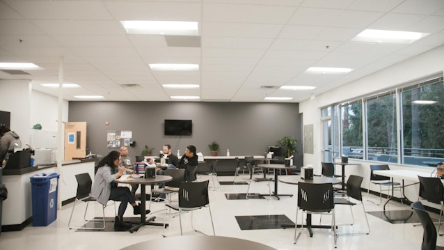 Spaces at Novanta, including this breakroom, now feature luminaire level lighting controls.