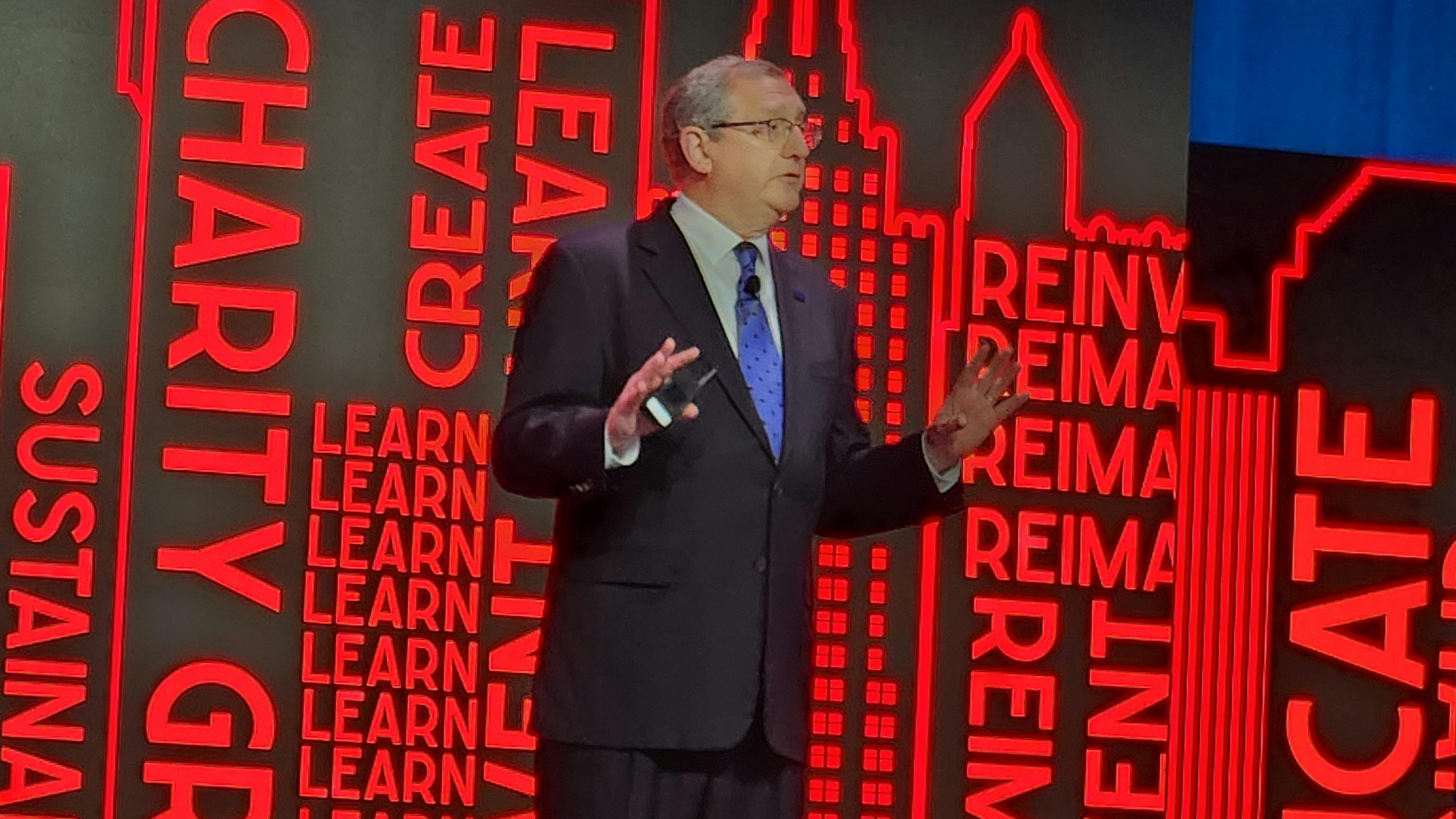 Henry Chamberlain delivers his State of the Industry address at the 2023 BOMA International Conference & Expo. Chamberlain is stepping down as BOMA International president and COO at the end of 2024, capping 39 years as a staff member of the organization.