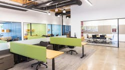 Becoming Independent’s new headquarters consolidates staff into one location. The admin area has energetic, modern office amenities. Becoming Independent’s new headquarters consolidates staff into one location. The admin area has energetic, modern office amenities.