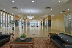 Prior to renovation, the lobby was dark, outdated and empty, with an occupancy rate of less than 50%. Prior to renovation, the lobby was dark, outdated and empty, with an occupancy rate of less than 50%.