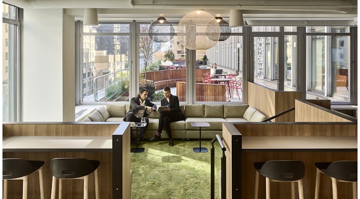A variety of seating areas, such as this one at EisnerAmper’s Manhattan office, are a popular amenity for people who want to work in different ways throughout the day. Consider offering spaces like this for different tenants to book.