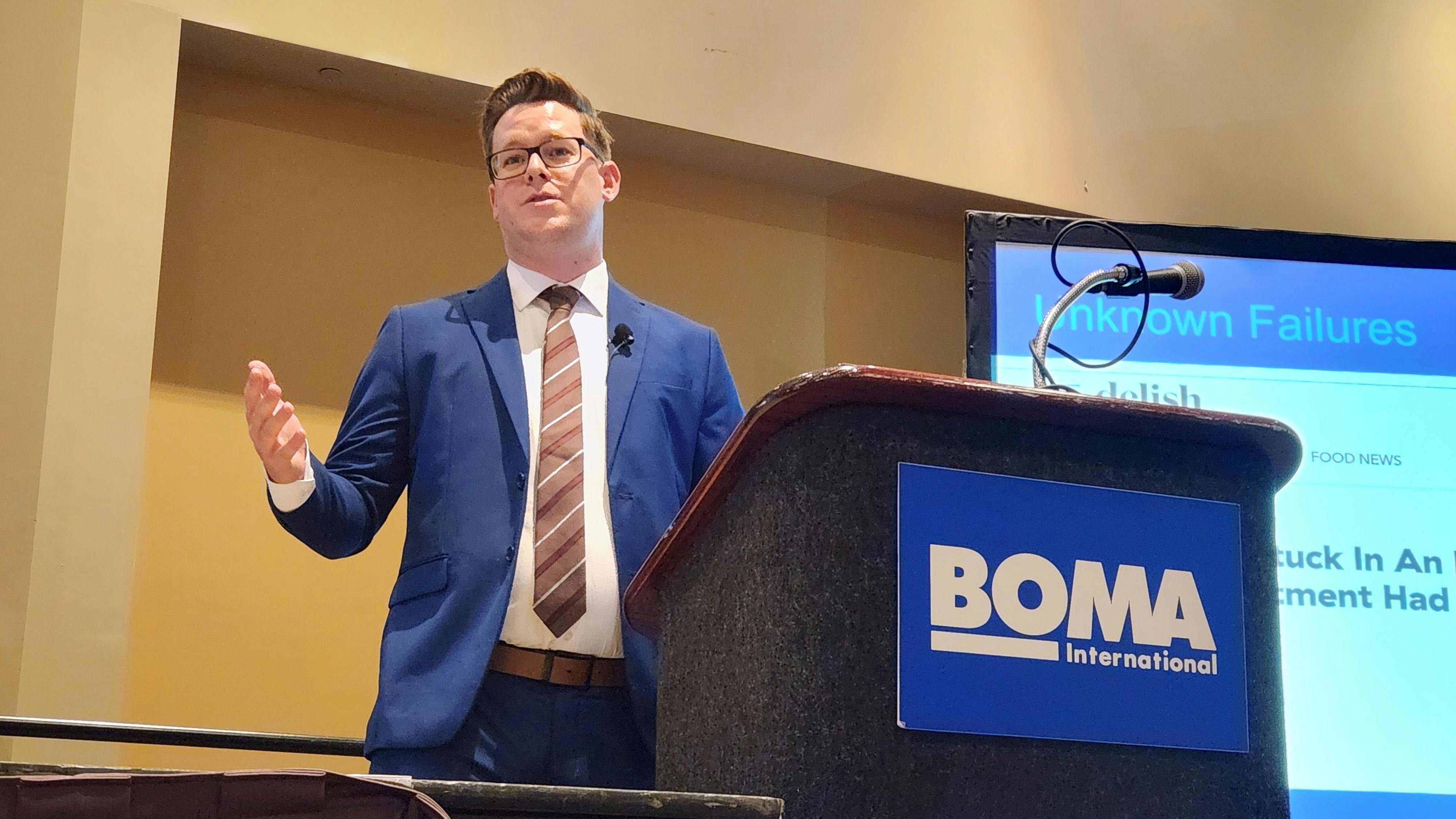 Nicholas Bequette, Ooma&rsquo;s director of strategic accounts for AirDial, speaks to the crowd at a Monday afternoon session at the 2024 BOMA International Conference & Expo.