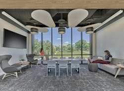 The top floor of Fahy Commons features a student lounge with custom-fabricated furniture created from site-salvaged wood. The lounge overlooks Muhlenberg College’s main campus. The top floor of Fahy Commons features a student lounge with custom-fabricated furniture created from site-salvaged wood. The lounge overlooks Muhlenberg College’s main campus.