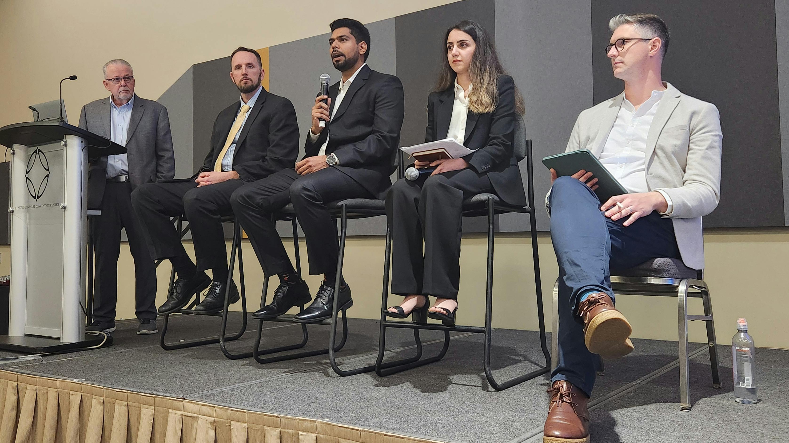 The AI panel at World Workplace, from left: moderator Dean Stanberry, past chair of the IFMA Global Board of Directors; Dr. Jake Smithwick, associate professor at the University of North Carolina at Charlotte; Dr. Dipin Kasana, director of business analytics for JLL; Dr. Mahnaz Ensafi, application manager for Planon; and Dr. Matt Tucker, IFMA&rsquo;s director of research.