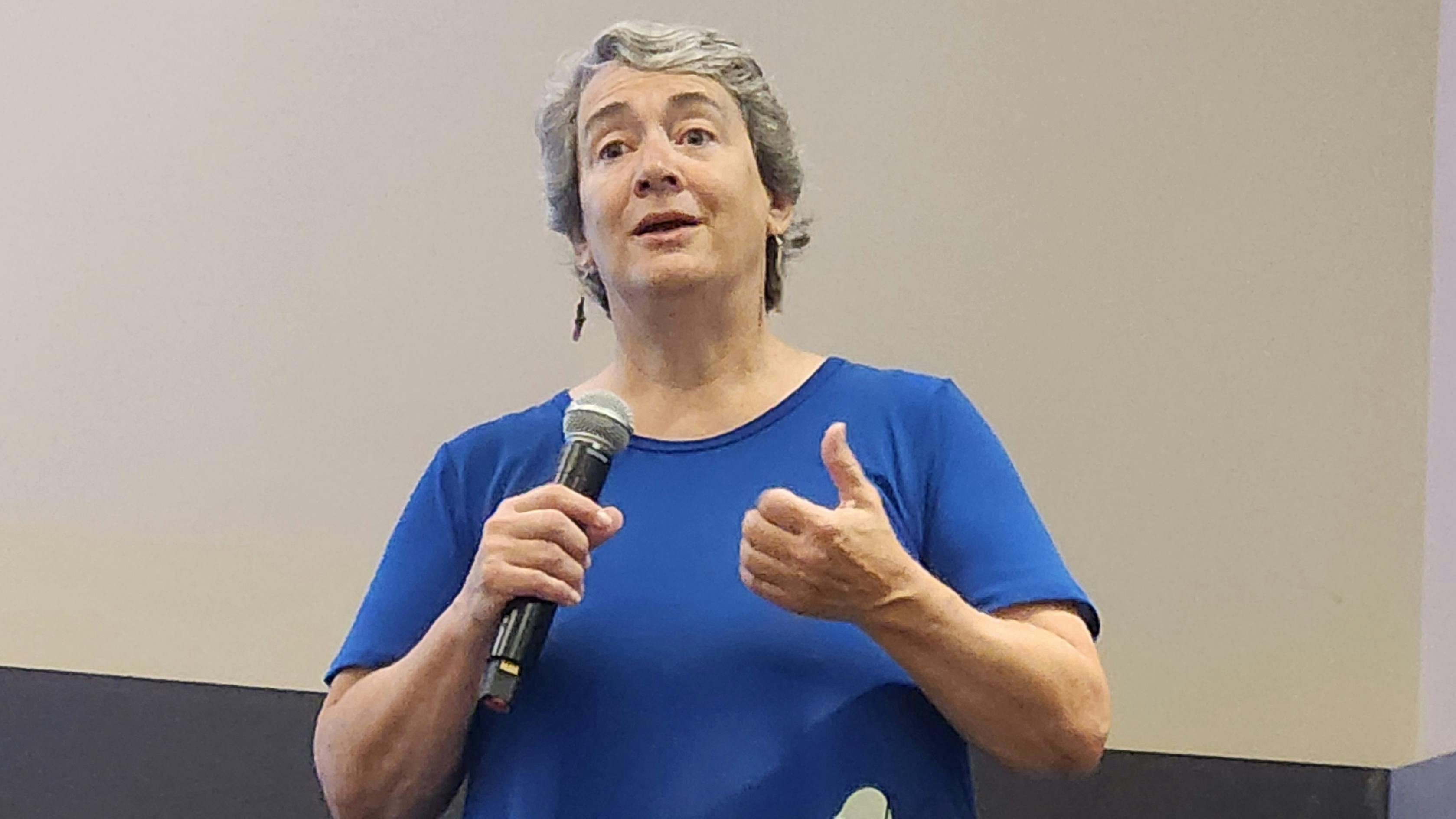 Lisa VanderHeyden, senior project manager for Arapahoe County Facilities & Fleet in Colorado, addresses a crowd at the 2024 IFMA World Workplace Conference & Expo on Friday, Oct. 11.