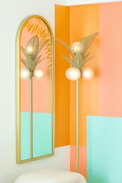 Floor lamps in the guestrooms channel palm trees. Floor lamps in the guestrooms channel palm trees.