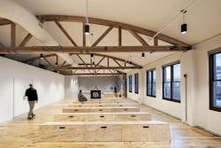 Inside the Loft space, featured wood trusses, seating and flooring. Inside the Loft space, featured wood trusses, seating and flooring.