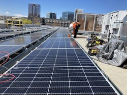 Two-thirds of the roof is fitted with solar panels. More panels are on a covered canopy over the parking garage. The building is fitted with a 38.7 kW solar array. Two-thirds of the roof is fitted with solar panels. More panels are on a covered canopy over the parking garage. The building is fitted with a 38.7 kW solar array.