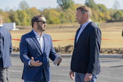 Mitch Fonseca, Chief Operating Officer at Edged, visits with New Albany Mayor Sloan Spalding at the topping out event of the Columbus data center. Mitch Fonseca, Chief Operating Officer at Edged, visits with New Albany Mayor Sloan Spalding at the topping out event of the Columbus data center.