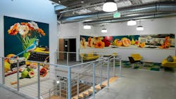 Luminis' LED high-bay pendant luminaire provides a timeless decorative appeal in the busy, industrial Multnomah County Library operations center. Luminis' LED high-bay pendant luminaire provides a timeless decorative appeal in the busy, industrial Multnomah County Library operations center.