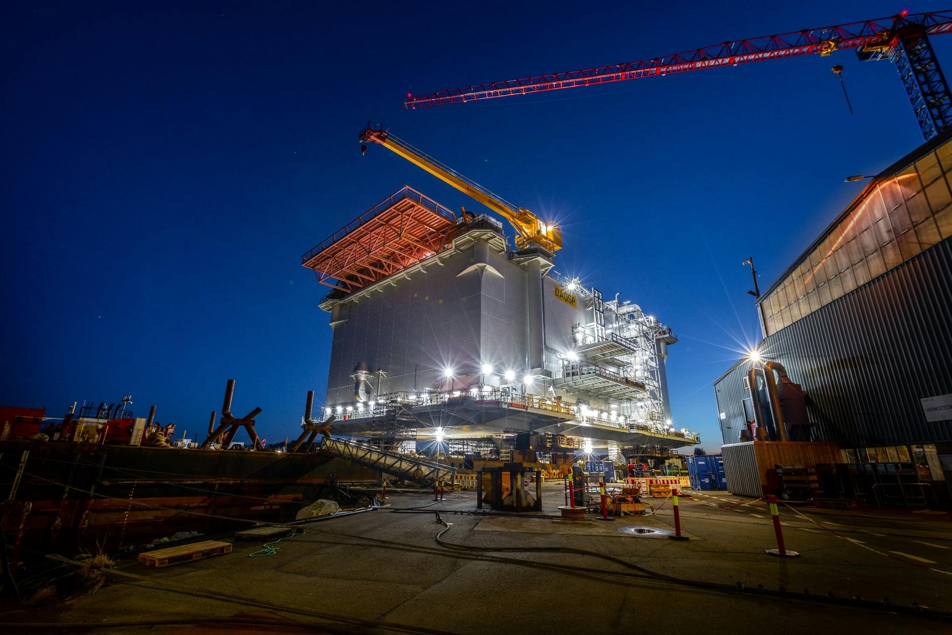 The Aibel substation with Glamox lighting sitting at the dock in Haugesund, Norway (above) before sailing to the Dogger Bank Wind Farm in March. Glamox is lighting both the interior and exterior (photos below).