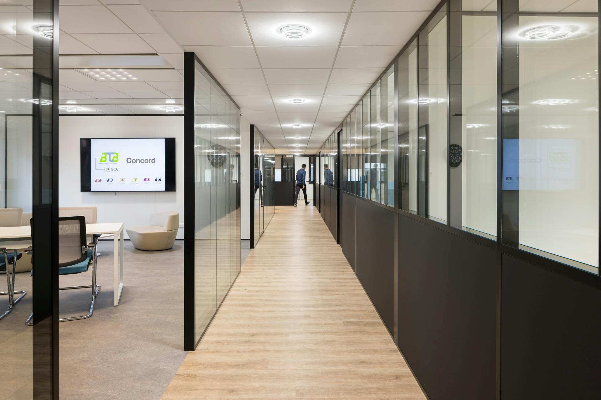 FIG. 1. Recently installed for BTB GES in Paris, France, Sylvania's Equinox - based on QuarkStar's Edge-X optical technology - provides a fill light at the same time as a downlight distribution, all from a single source of LEDs. The design mitigates glare and provides more of an open-sky feel while also creating an aesthetically pleasing halo effect.