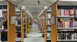 The ateljé Lyktan LED “Supertubes” in fittings above the bookshelves at the Jönköping Library in Jönköping, Sweden are retrofit replacements.