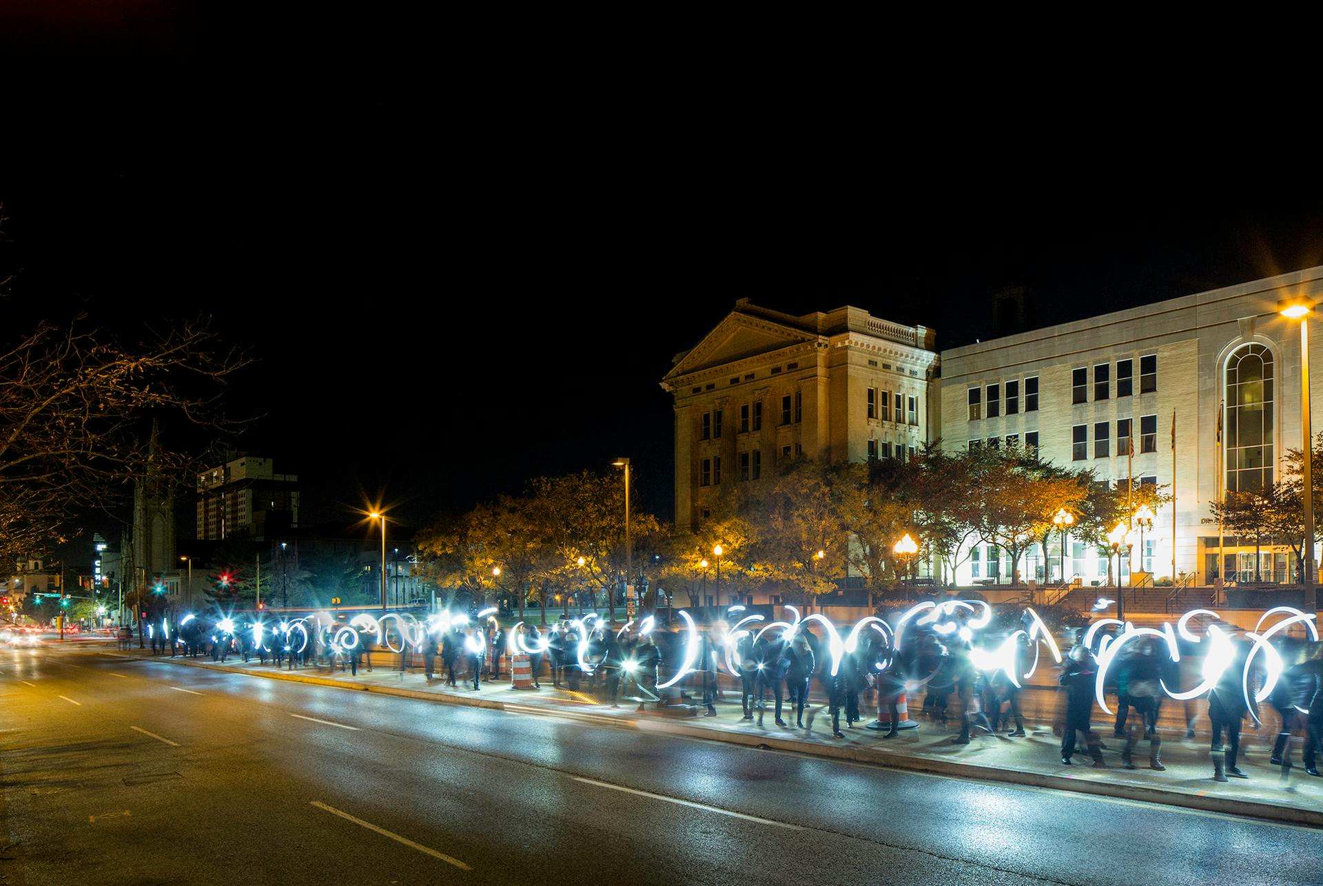 'Flash!' brought Baltimore residents out for an evening walk with portable LED lights.