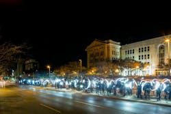 'Flash!' brought Baltimore residents out for an evening walk with portable LED lights. 'Flash!' brought Baltimore residents out for an evening walk with portable LED lights.