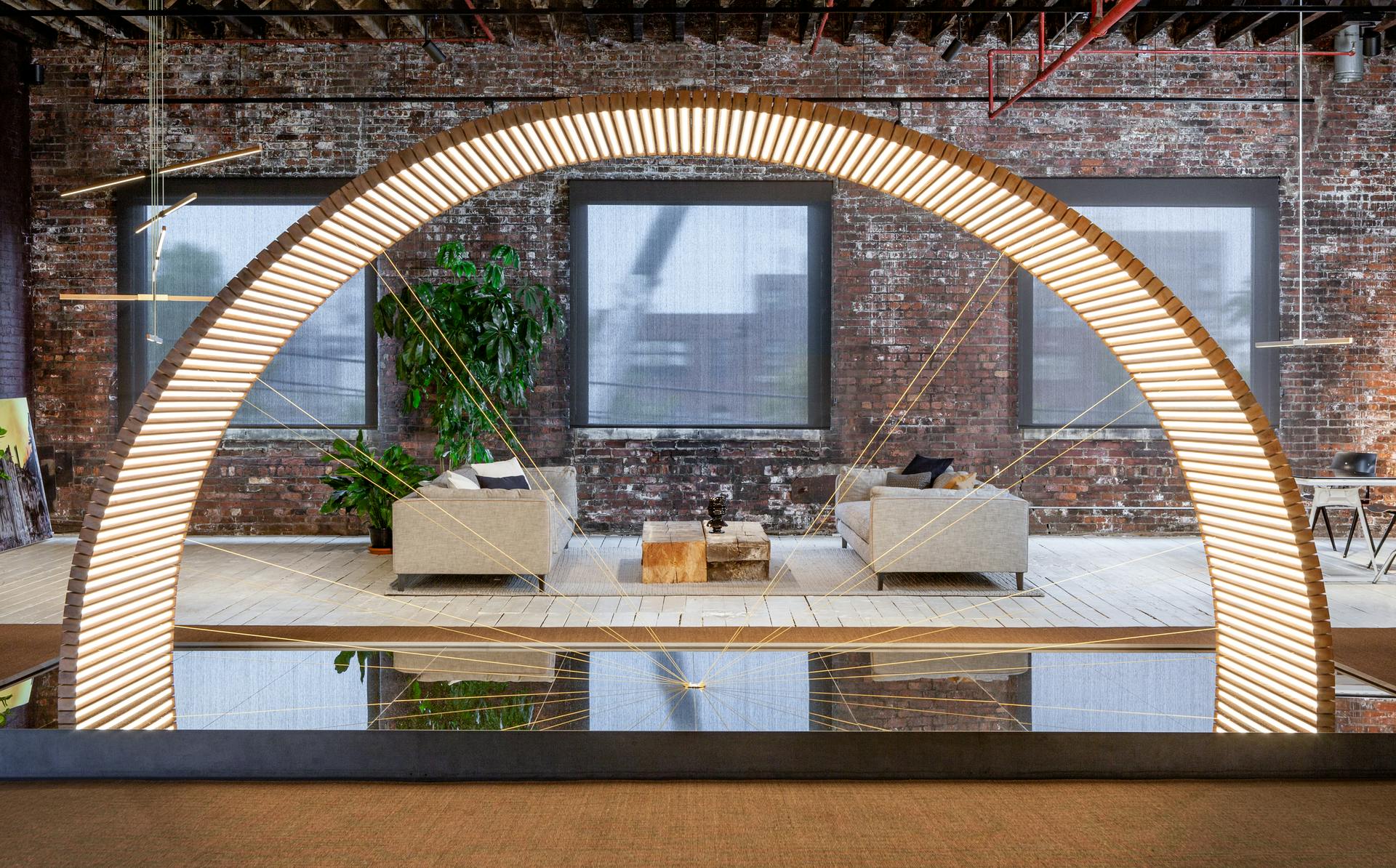 During LEDucation, RUX Design founder and Stickbulb co-founder Russell Greenberg highlighted the use of reclaimed materials, such as the redwood in this &ldquo;Ambassador&rdquo; LED sculpture, as a key part of the firm&rsquo;s modular fixture designs embodying circular economy concepts.