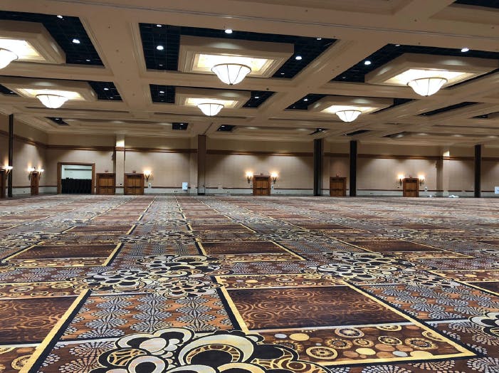 Las Vegas&rsquo; iconic Mandalay Bay Resort and Casino has upgraded its convention center ballrooms to wirelessly-controlled LED lighting in a project with Roth Lighting, relying on Filamento Valto high-bay lamps and Avi-on Controls&rsquo; Bluetooth Mesh modules. (Photo credit: Image from Roth Lighting via Filamento.)