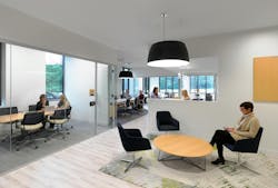 Project customer TriHealth worked with architects at GBBN and lighting consultants at Eureka to select luminaires that would provide unobtrusive, functional lighting that works in concert with the natural daylight available. The drum-shaped Aperture LED luminaires deliver uniform, diffuse light while hiding the point source from the eye for comfort. (Photo credit: Image courtesy of Eureka Lighting.) Project customer TriHealth worked with architects at GBBN and lighting consultants at Eureka to select luminaires that would provide unobtrusive, functional lighting that works in concert with the natural daylight available. The drum-shaped Aperture LED luminaires deliver uniform, diffuse light while hiding the point source from the eye for comfort. (Photo credit: Image courtesy of Eureka Lighting.)