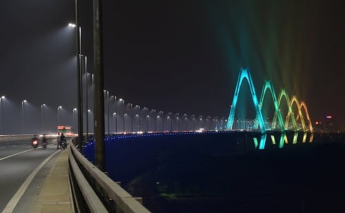 Philips architectural lighting turns modern Hanoi bridge into a colorful LED light display