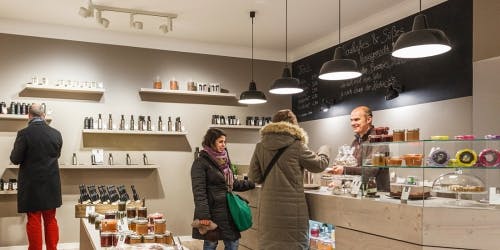 LED retail lighting: Solais enhances Tumi, Erco sells olive oil