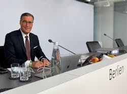 Outgoing Osram CEO Olaf Berlien sits at the top table here at the company's shareholders' meeting earlier this month, where voters approved the ams 'domination' status that is now leading to his ouster. At the time, Berlien said that the domination 'will enable Osram and ams together to forge the European global market leader in optical solutions.' (Photo credit: Image courtesy of Osram.) Outgoing Osram CEO Olaf Berlien sits at the top table here at the company's shareholders' meeting earlier this month, where voters approved the ams 'domination' status that is now leading to his ouster. At the time, Berlien said that the domination 'will enable Osram and ams together to forge the European global market leader in optical solutions.' (Photo credit: Image courtesy of Osram.)