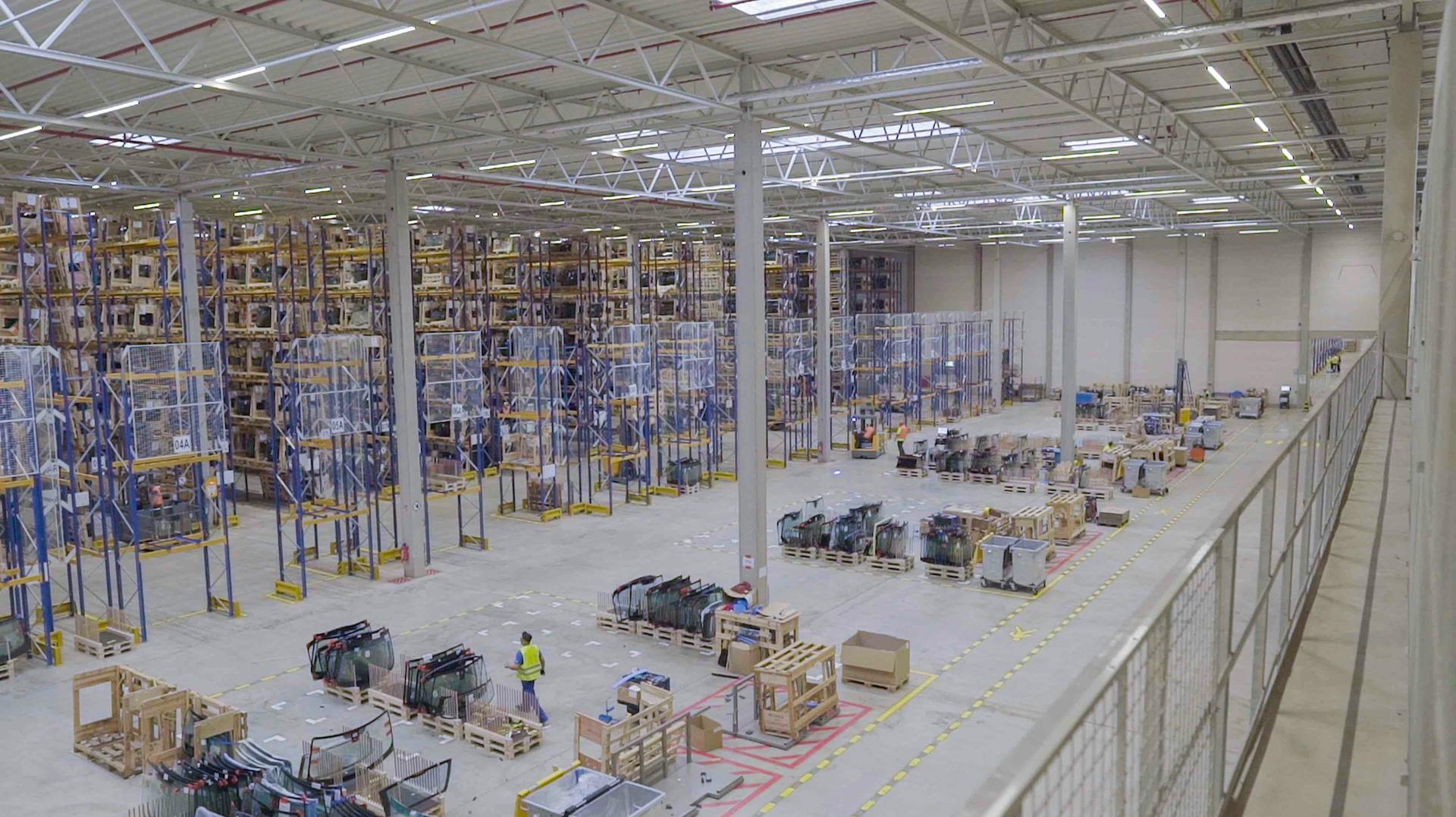 The Signify LED lighting system illuminates, gathers data, and analyzes it for this Pilkington Automotive warehouse in Gelsenkirchen, Germany. (Photo credit: Image courtesy of Signify.)