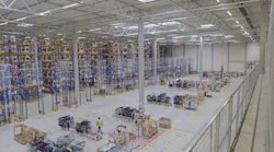 The Signify LED lighting system illuminates, gathers data, and analyzes it for this Pilkington Automotive warehouse in Gelsenkirchen, Germany. (Photo credit: Image courtesy of Signify.)