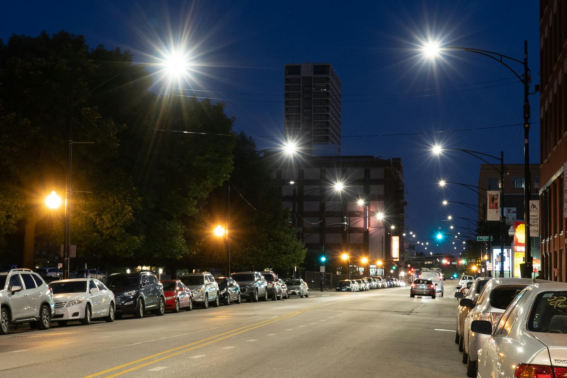 FIG. 1. Smart cities like Chicago are enabled by LED-based smart outdoor lighting that connects with centralized software, external sensors, data collection nodes, and other devices supported by multiple networking standards on each layer of the network. (Photo credit: Image courtesy of CDOT/Metro Strategies, Inc. and Kyle Duff.)