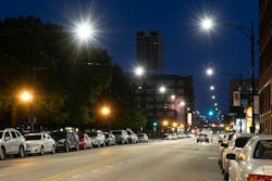 FIG. 1. Smart cities like Chicago are enabled by LED-based smart outdoor lighting that connects with centralized software, external sensors, data collection nodes, and other devices supported by multiple networking standards on each layer of the network. (Photo credit: Image courtesy of CDOT/Metro Strategies, Inc. and Kyle Duff.) FIG. 1. Smart cities like Chicago are enabled by LED-based smart outdoor lighting that connects with centralized software, external sensors, data collection nodes, and other devices supported by multiple networking standards on each layer of the network. (Photo credit: Image courtesy of CDOT/Metro Strategies, Inc. and Kyle Duff.)